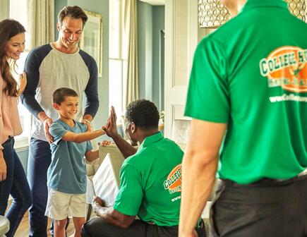 College hunk high five child